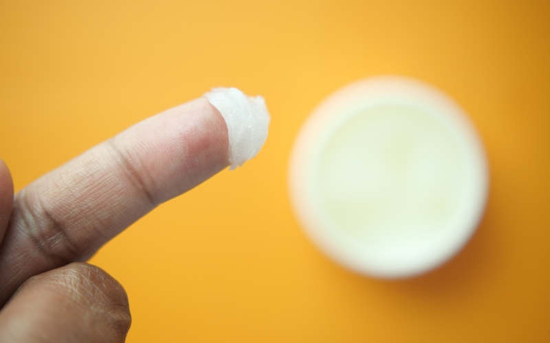 Man using vaseline for his wound